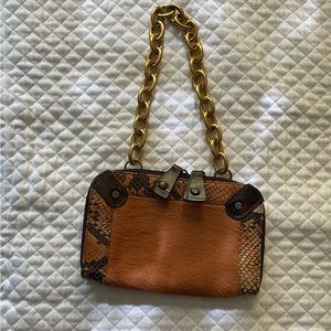 Sintesis brown cowhide/snakeskin trim and gold chain clutch/shoulder bag
